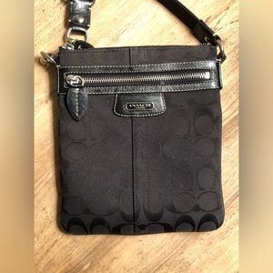 Coach purse with purple lining